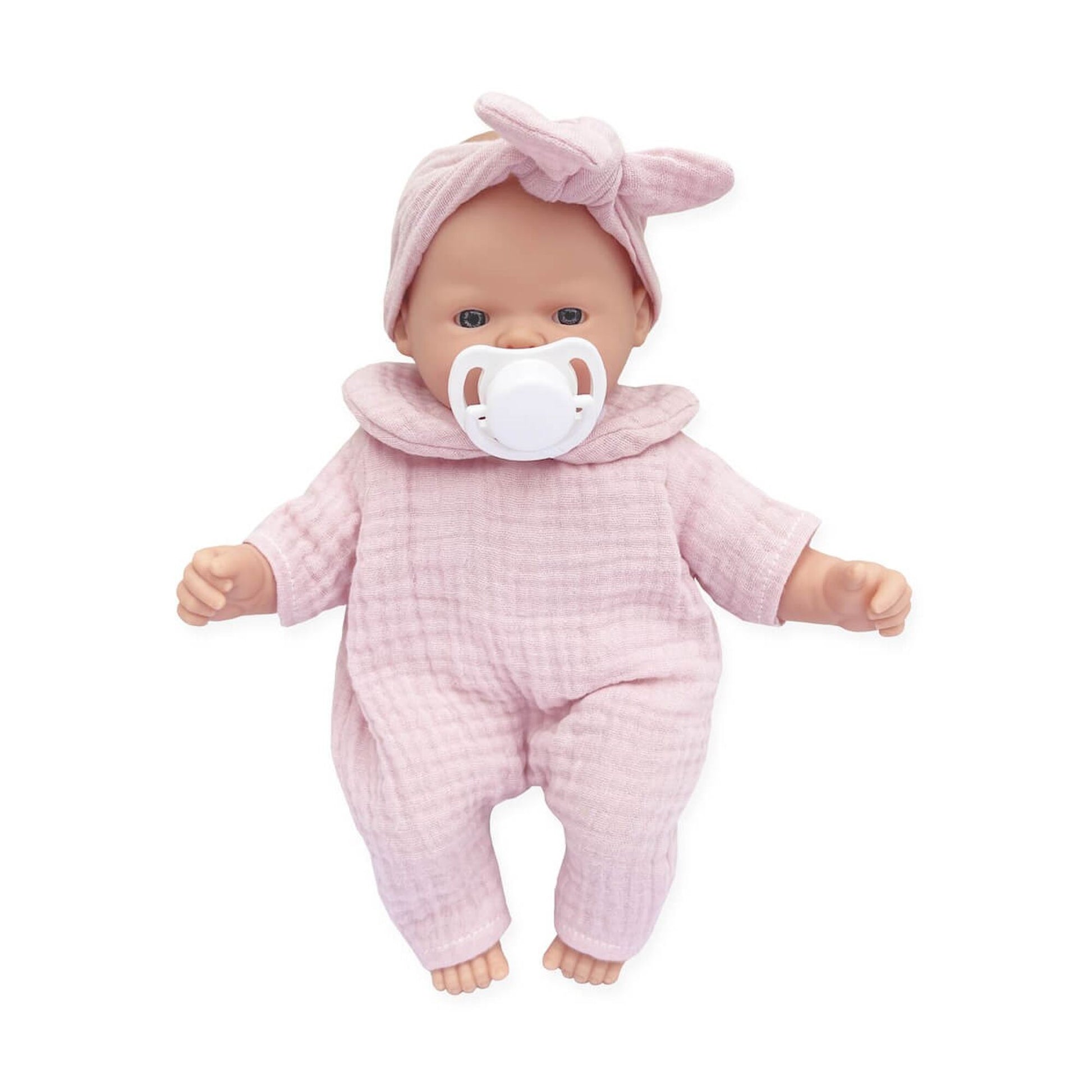Pink baby doll with dummy