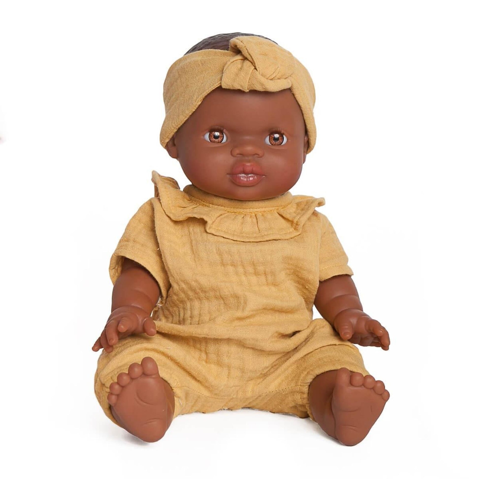 Black boy doll sitting
