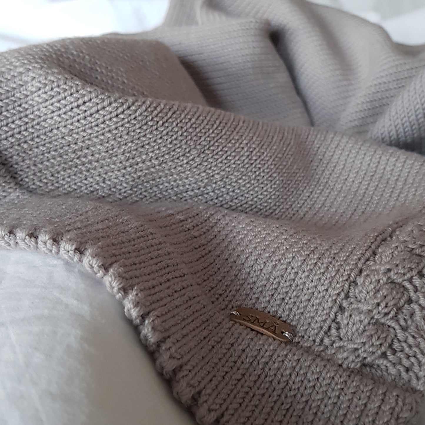 Soft knitted blanket, sand