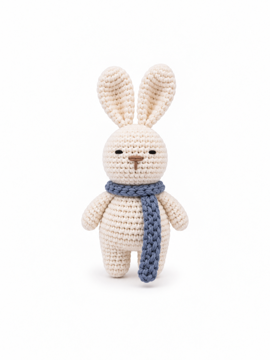 Handmade ivory crochet bunny with a dusty blue knitted scarf