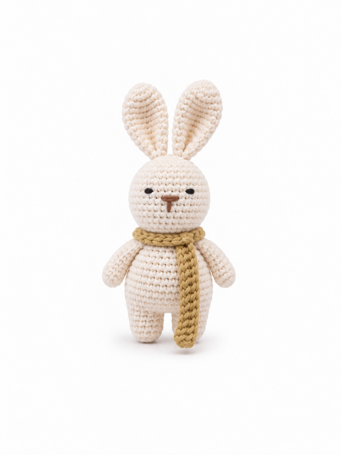 Handmade ivory crochet bunny with a mustard yellow crochet scarf