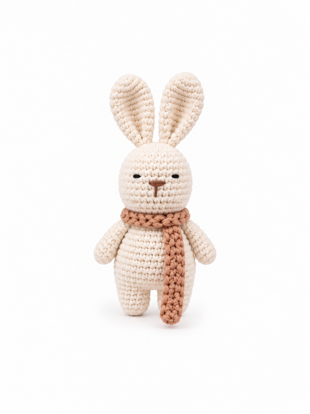 Handmade cream crochet bunny with an apricot-colored scarf