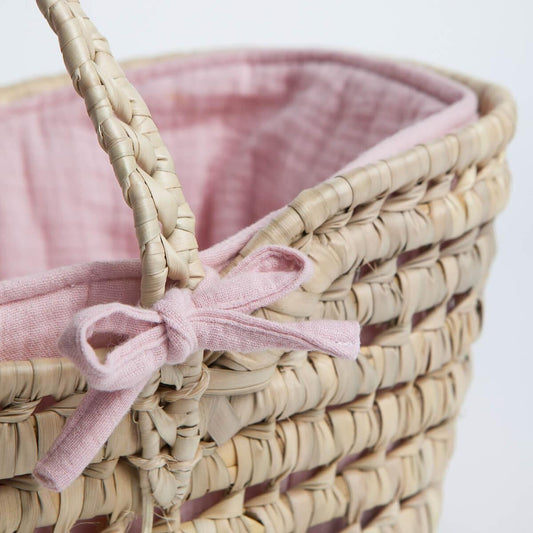 pink doll bassinet detail