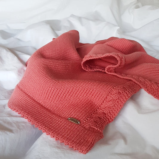 Soft knitted blanket, coral