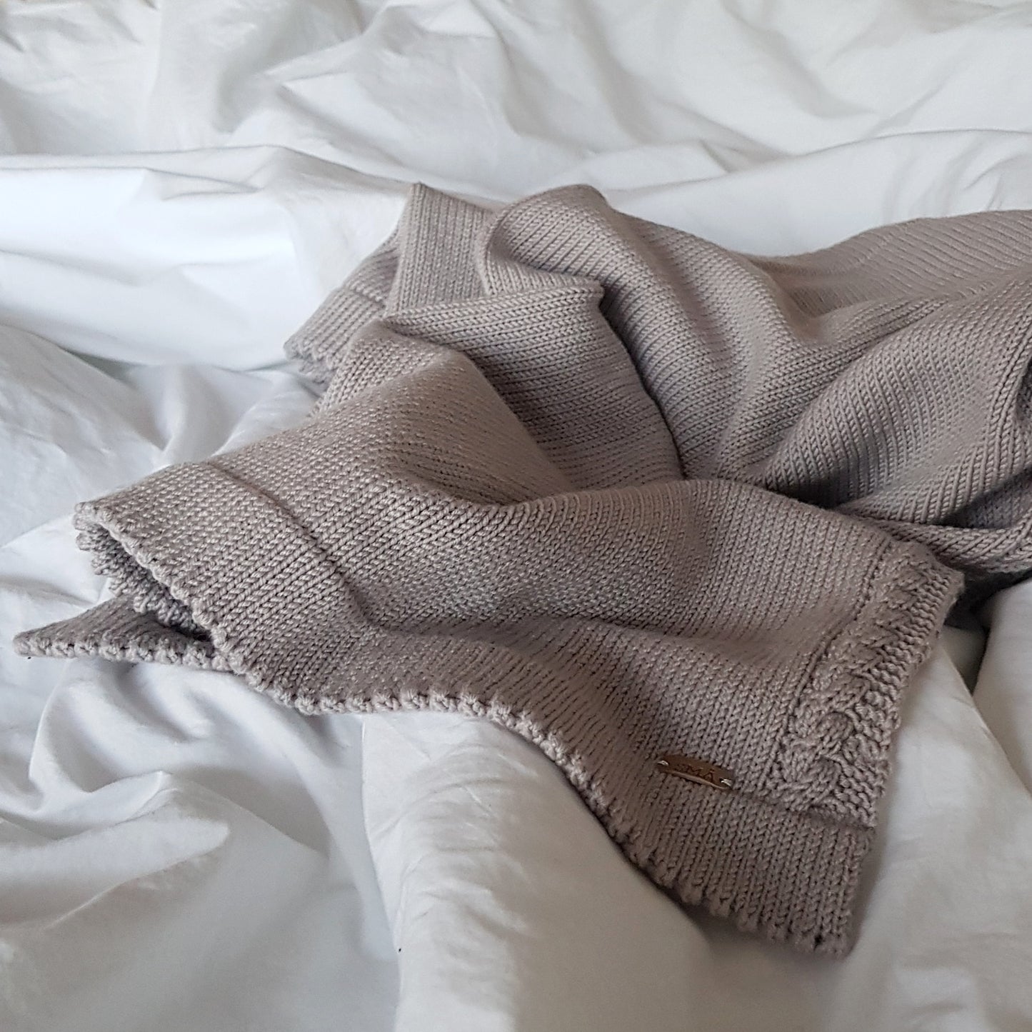 Soft knitted blanket, sand